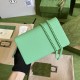 .   Packaged in a full set of original green boxes   This chain strap wallet from the GG Marmont collection revitalizes a design from previous collections and is crafted in a refreshing light green leather, bringing a st