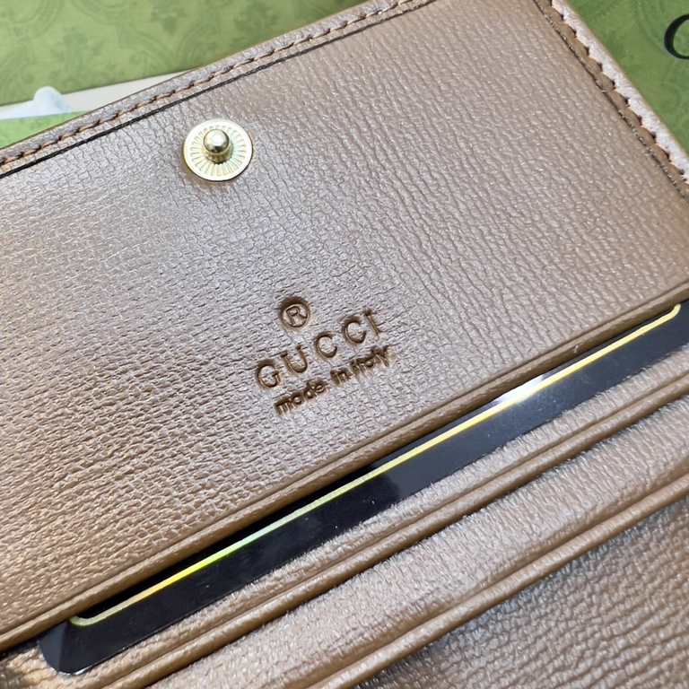 New to the      SpringSummer collection is the Gucci    1955 Horsebit Card Case in GG Supreme premium faux canvas and brown leather. This detail is inspired by the brand's equestrian roots and is part of Gucci's classic 