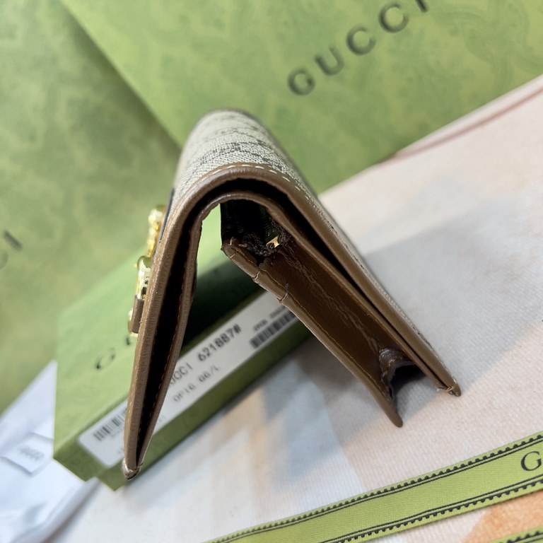 New to the      SpringSummer collection is the Gucci    1955 Horsebit Card Case in GG Supreme premium faux canvas and brown leather. This detail is inspired by the brand's equestrian roots and is part of Gucci's classic 