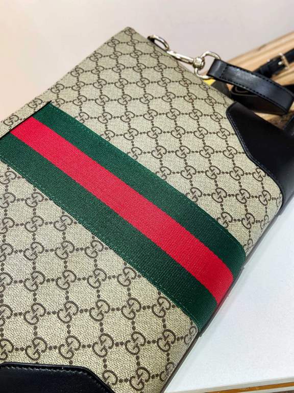 Buy Authentic PublishingFlat Messenger Shoulder Bag with a removable shoulder strap, crafted in Gucci's signature GG Supreme premium faux canvas in a black and gray combination. In addition to the GG pattern, a webbing s