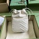 .   Comes with a full set of original green box packaging  GG Marmont Collection Mini Bucket Bag. This mini bucket bag is crafted in white quilted V-shaped leather. A signature element of the GG Marmont collection, the g