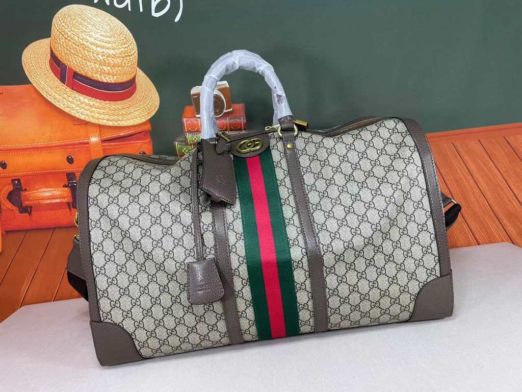 An oversized version of the   classic GG motif travel bag, which originally made its stunning debut in the Aria - Fashion Aria collection, returns this season in a high-profile statement of the brand's logo in iconic tra