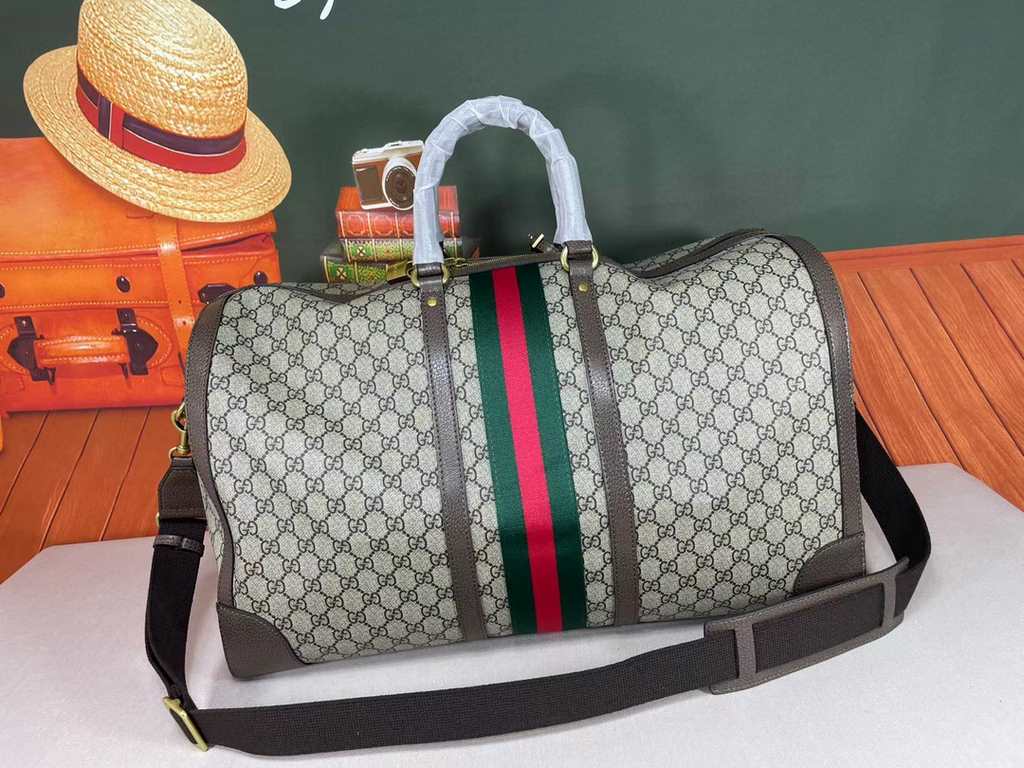 An oversized version of the   classic GG motif travel bag, which originally made its stunning debut in the Aria - Fashion Aria collection, returns this season in a high-profile statement of the brand's logo in iconic tra