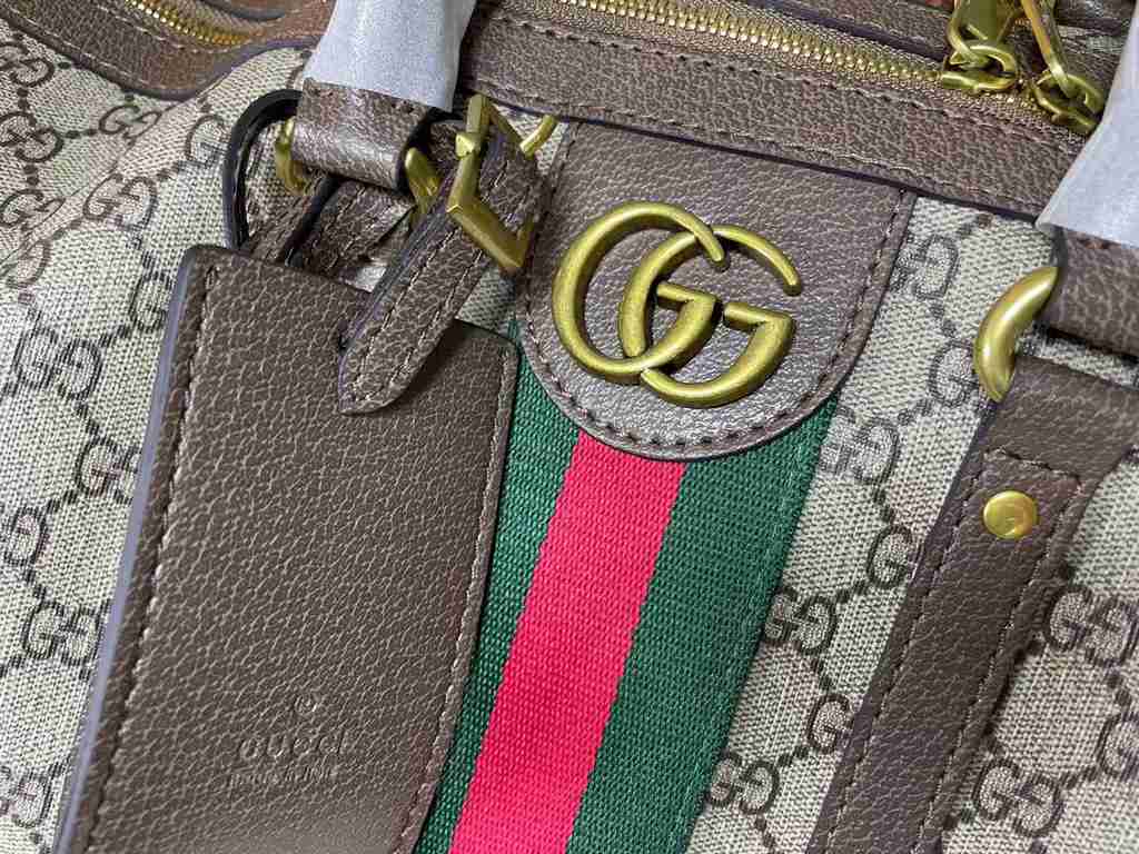 An oversized version of the   classic GG motif travel bag, which originally made its stunning debut in the Aria - Fashion Aria collection, returns this season in a high-profile statement of the brand's logo in iconic tra