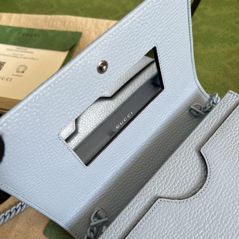 .   Comes in a full set of original green box packaging   This GG Marmont chain wallet revitalizes designs from previous collections and is crafted in crisp light blue leather, bringing a stunning piece to the Gucci Marc