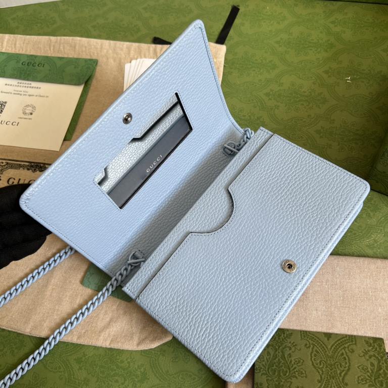 .   Comes in a full set of original green box packaging   This GG Marmont chain wallet revitalizes designs from previous collections and is crafted in crisp light blue leather, bringing a stunning piece to the Gucci Marc