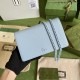 .   Comes in a full set of original green box packaging   This GG Marmont chain wallet revitalizes designs from previous collections and is crafted in crisp light blue leather, bringing a stunning piece to the Gucci Marc