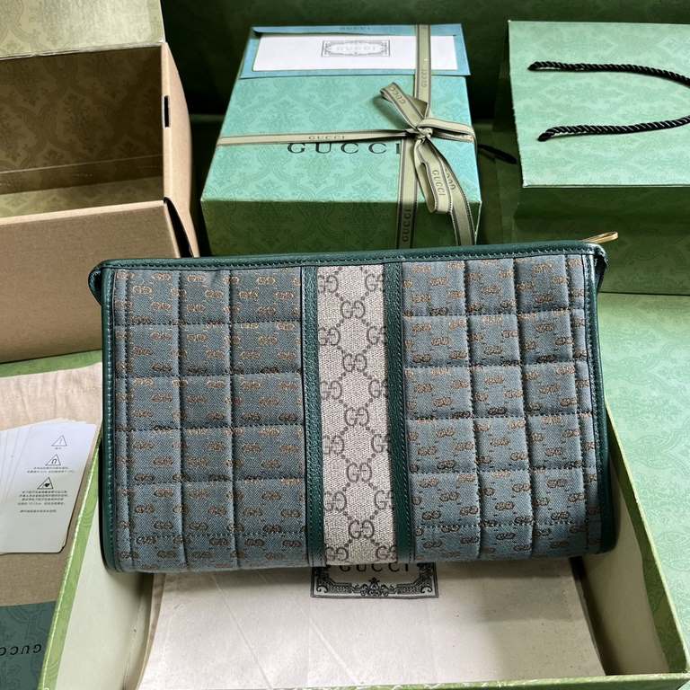 .   with full original green box packaging  Mini GG Canvas Clutch Bag.Gucci's small leather accessories push the boundaries of design and continue to reinterpret classic travel pieces in a personalized way. This men's cl