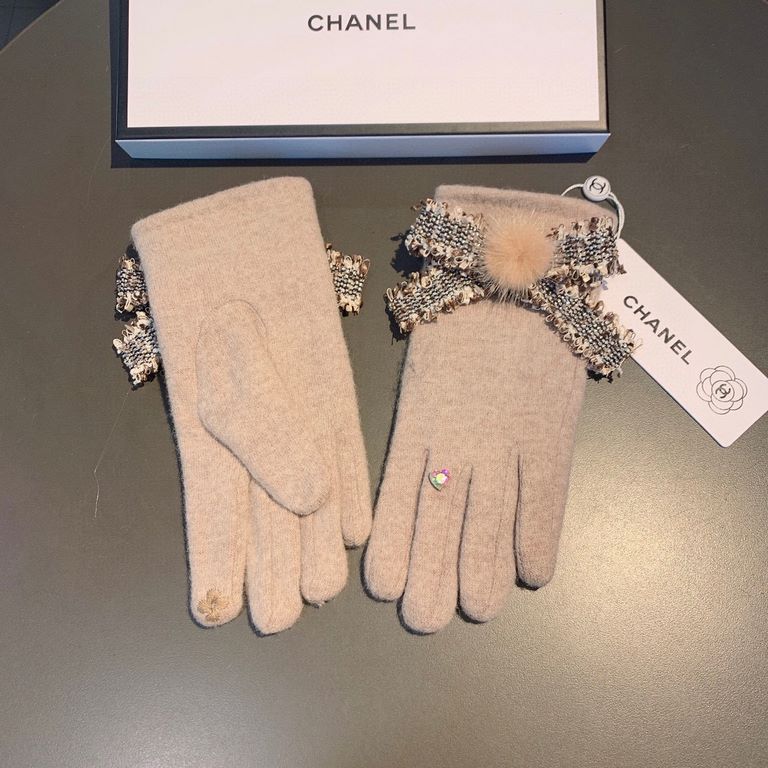 Batch      .Chanel Chanel counter new wool gloves, fashion gloves, fall and winter warm padded lining, super whine bow  , on the hand super comfortable and soft, versatile! Matching box   average size