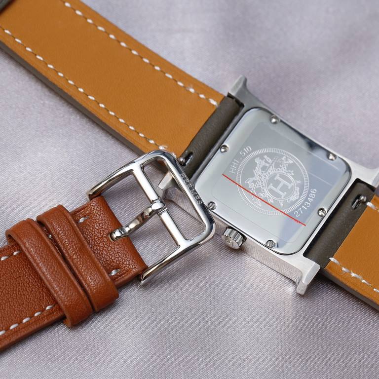 Hermès HERMèS HEURE H collection. The letter H is used to shape the case of the watch, a sign of the Maison's maverick, standard-issue style that has evolved over time and remains a constant, making it one of the most po