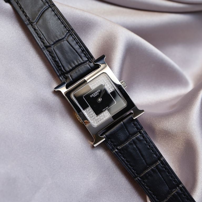 Hermès HERMèS HEURE H collection. The letter H is used to shape the case of the watch, a sign of the Maison's maverick, standard-issue style that has evolved over time and remains a constant, making it one of the most po