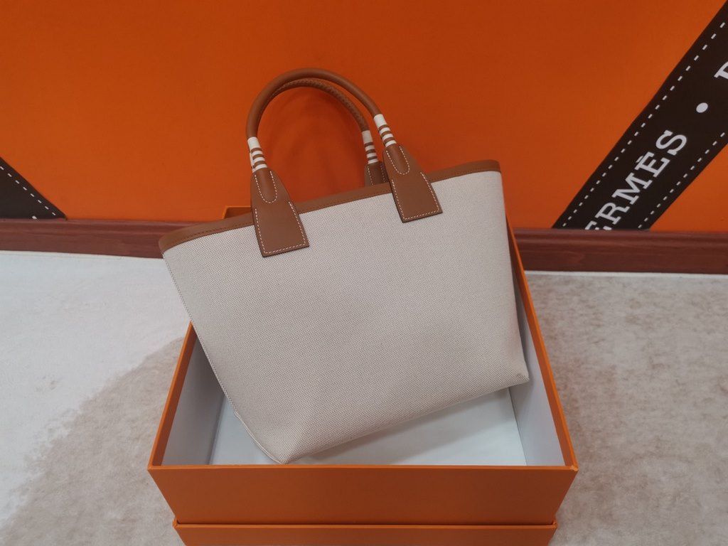 New for '23, the Hermes Steeple tote bag is so durable, in Hplume canvas   Swift calf leather, with hand-wrapped handles and a removable canvas bottom.Size 25cm(L)23cm(D)15cm(W)