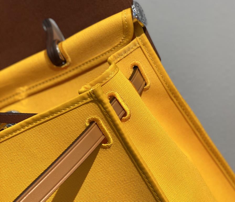 Herbag Amber YellowSuper handsome commuter bag, between casual and formal, casual without losing elegance, the combination of canvas and cowhide  leather, the outer seam is hard and stylish.Super high cost-effective in st