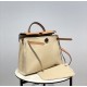 Herbag Creamy AlmondSuper handsome commuter bag, between casual and formal, casual without losing elegance, the combination of canvas and cowhide  leather, the outer seams are stiff and stylish.The combination of canvas a