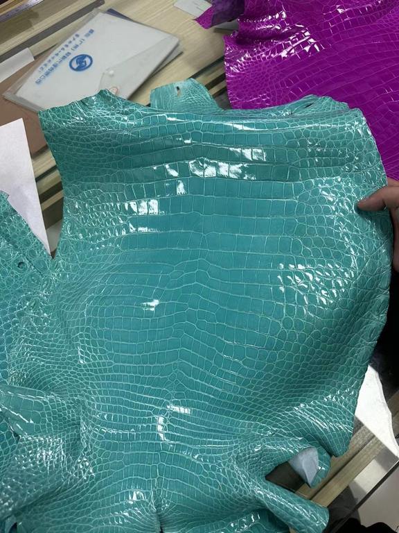 Glossy Nile crocodile skin, if you need it, chat with me.