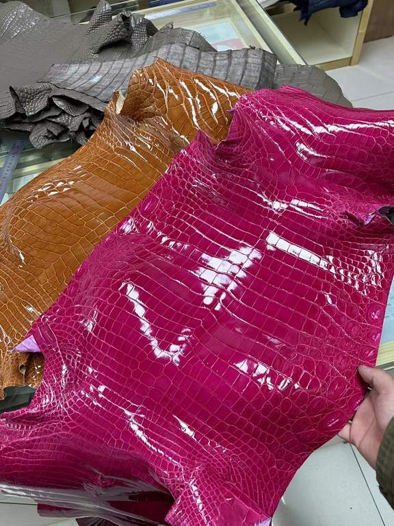 Glossy Nile crocodile skin, if you need it, chat with me.