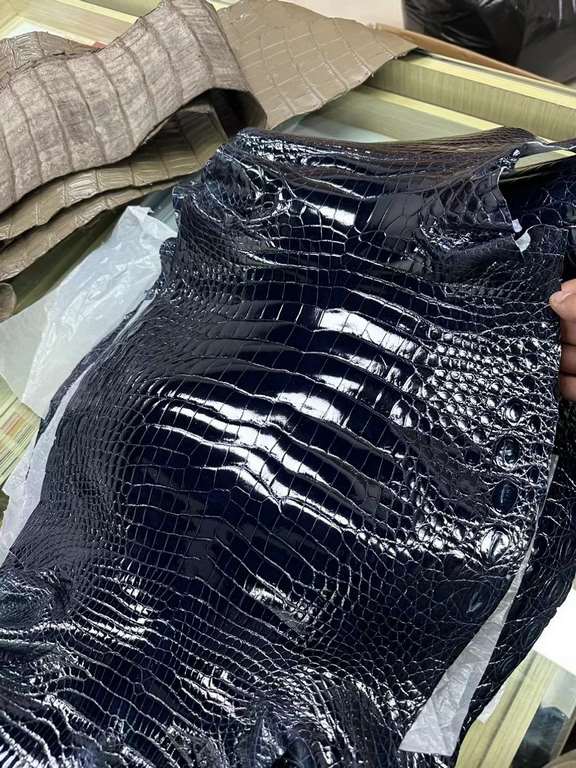 Glossy Nile crocodile skin, if you need it, chat with me.