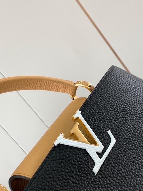 M59466 Black with Apricot Gold Buckle]A modern clash of shades in full-grain cowhide leather, this medium Capucines bag features the iconic LV alphabet and side loops, top handles and a detachable shoulder strap for vers