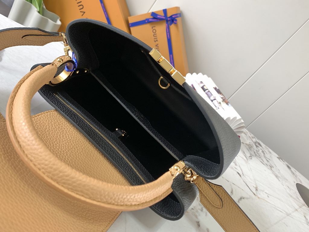 M59466 Black with Apricot Gold Buckle]A modern clash of shades in full-grain cowhide leather, this medium Capucines bag features the iconic LV alphabet and side loops, top handles and a detachable shoulder strap for vers