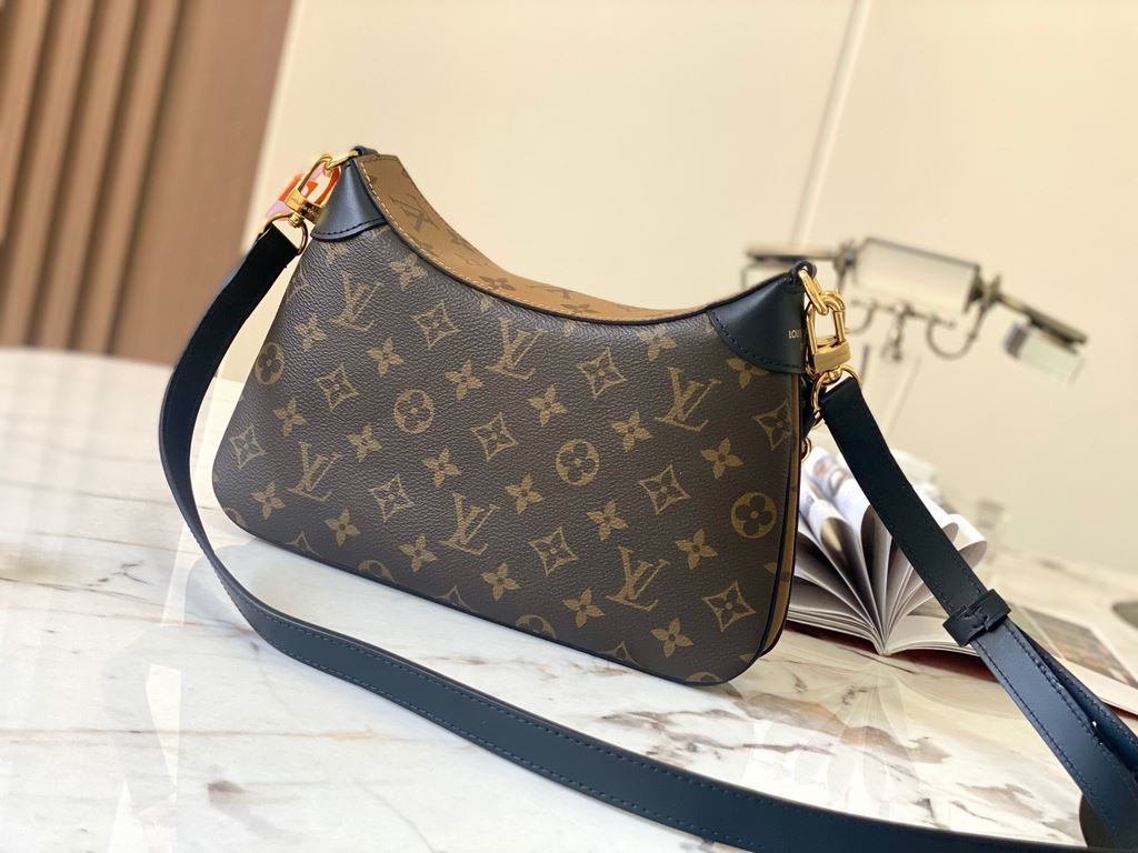 Top TWINNY Handbag M46659 In Monogram and Monogram Reverse canvas with leather trimmings, this cozy yet sophisticated bag is detailed with an S-lock closure and a braided chain strap handle, and can be worn over the elbo