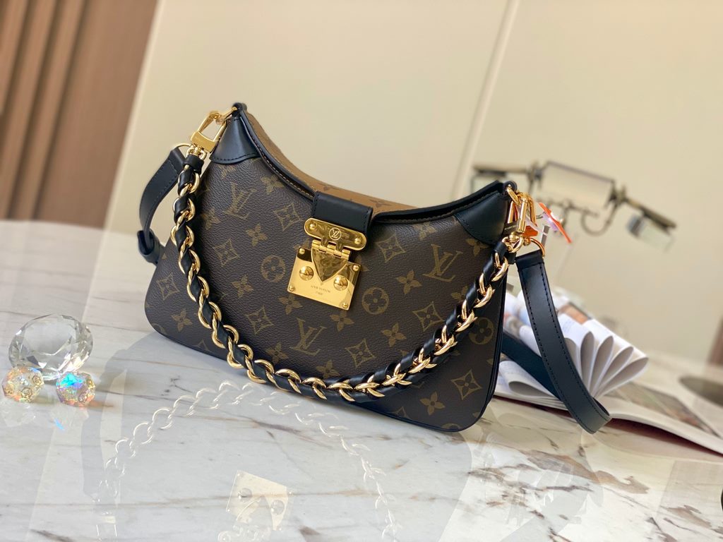 Top TWINNY Handbag M46659 In Monogram and Monogram Reverse canvas with leather trimmings, this cozy yet sophisticated bag is detailed with an S-lock closure and a braided chain strap handle, and can be worn over the elbo