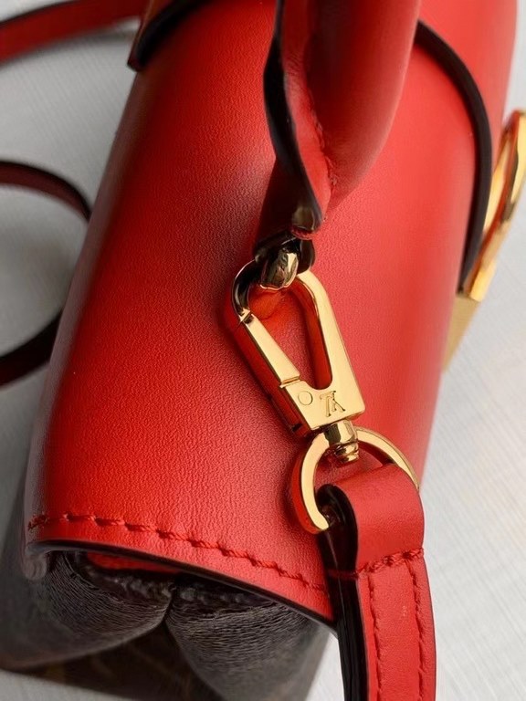 Top of the line SpecialtyLocky BB Handbag M44322 Red, this compact and stylish Locky BB handbag in Monogram canvas and cowhide leather with an eye-catching large gold padlock closure combines sophistication and style. It