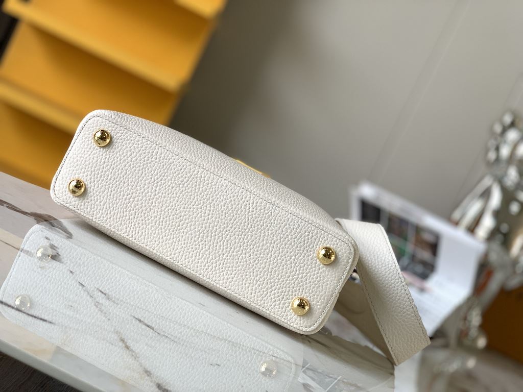 M59465 Pearl White with Pale Yellow Gold Buckle]A modern clash of shades in full-grain cowhide leather, this Capucines BB bag features the iconic LV alphabet and side loops, top handles and a detachable shoulder strap fo