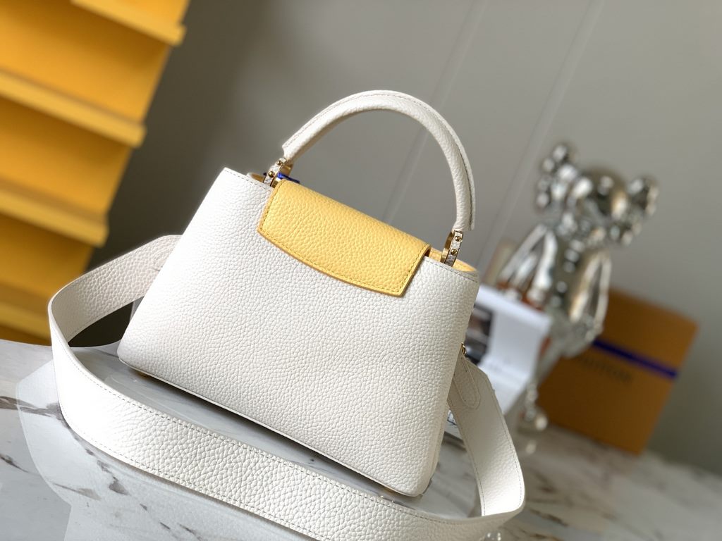 M59465 Pearl White with Pale Yellow Gold Buckle]A modern clash of shades in full-grain cowhide leather, this Capucines BB bag features the iconic LV alphabet and side loops, top handles and a detachable shoulder strap fo