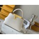 M59465 Pearl White with Pale Yellow Gold Buckle]A modern clash of shades in full-grain cowhide leather, this Capucines BB bag features the iconic LV alphabet and side loops, top handles and a detachable shoulder strap fo