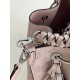 ExclusiveM58788 Pearlescent Pink] The Muria Bucket Bag is crafted from cutout cowhide leather that lends a metallic sheen to the perforated Monogram pattern, and is finished with a leather name tag and key holder. Explor