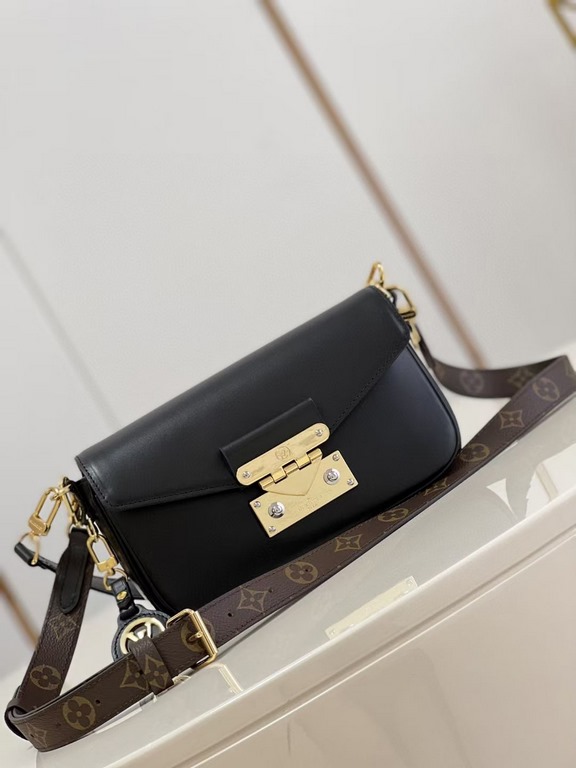 TopThe M20393 Swing bag in black was presented on the SpringSummer 2022 runway and is based on Louis Vuitton's Pochette Métis bag, an on-trend reinterpretation of the long and slender bag. The classic S-lock closure exte