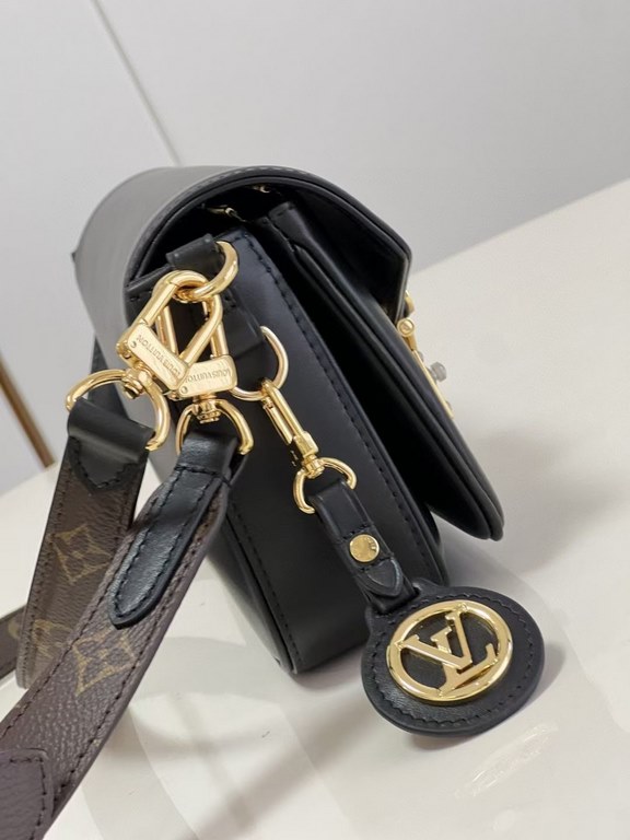 TopThe M20393 Swing bag in black was presented on the SpringSummer 2022 runway and is based on Louis Vuitton's Pochette Métis bag, an on-trend reinterpretation of the long and slender bag. The classic S-lock closure exte