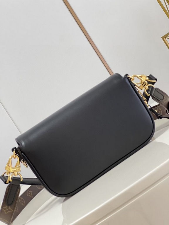 TopThe M20393 Swing bag in black was presented on the SpringSummer 2022 runway and is based on Louis Vuitton's Pochette Métis bag, an on-trend reinterpretation of the long and slender bag. The classic S-lock closure exte