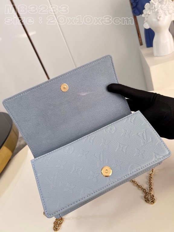 Exclusive M83233 Light Blue 】Crafted from soft grained Monogram Empreinte leather, this Wallet On Chain Lily is a compact flap pouch with a sharp rectangular silhouette and understated vintage styling that keeps essentia