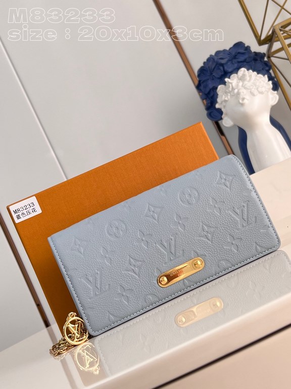 Exclusive M83233 Light Blue 】Crafted from soft grained Monogram Empreinte leather, this Wallet On Chain Lily is a compact flap pouch with a sharp rectangular silhouette and understated vintage styling that keeps essentia