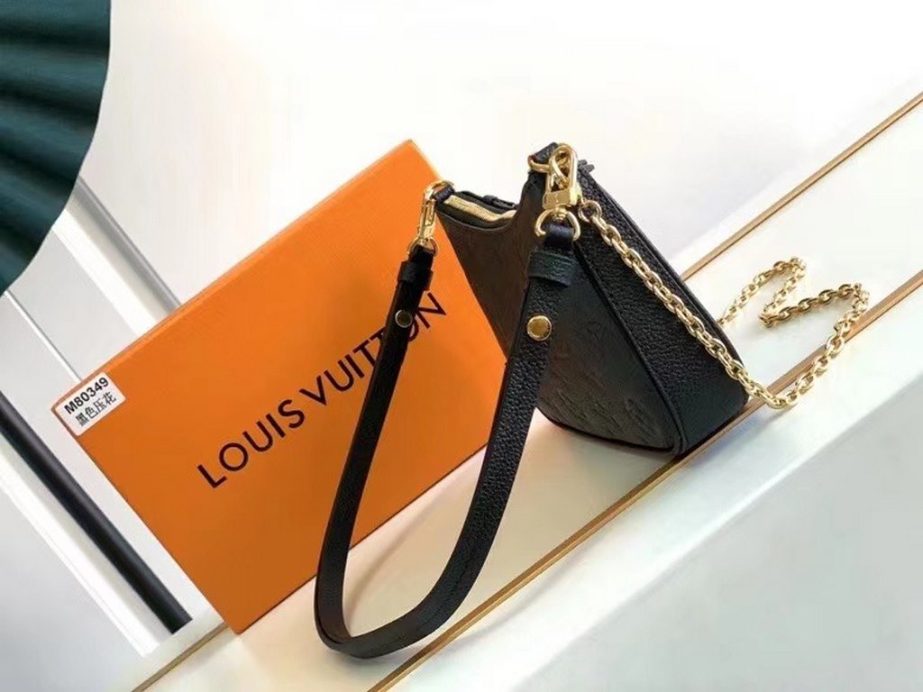 SpecialtyM81066 M80349 The Spring 2022 Easy Pouch On Strap is crafted from Monogram Empreinte leather with Monogram embossing and a soft texture. The chain and adjustable leather shoulder strap make it easy to carry on t