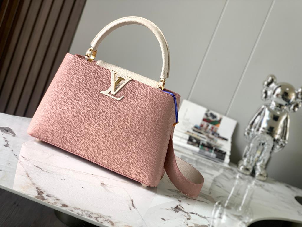 M59466 Rose Pink with Pearl Platinum Buckle]A modern clash of shades in full-grain cowhide leather, this medium Capucines bag features the iconic LV alphabet and side loops, top handles and a detachable shoulder strap fo