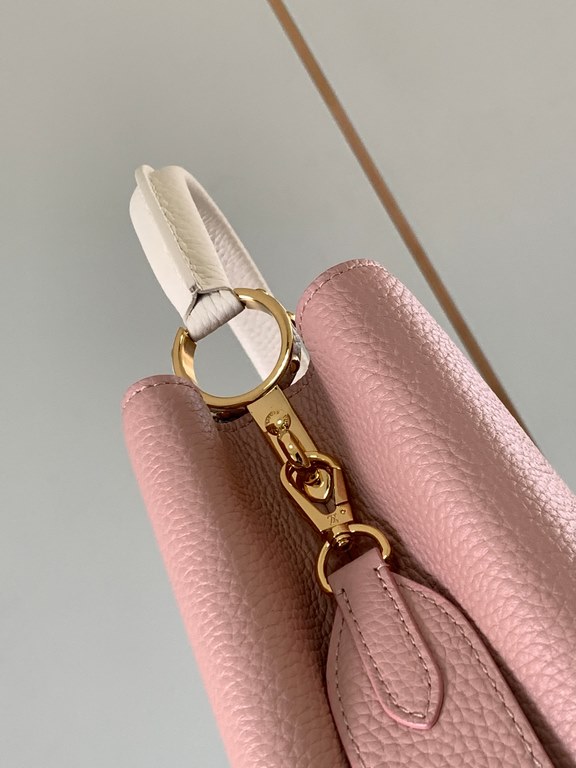 M59466 Rose Pink with Pearl Platinum Buckle]A modern clash of shades in full-grain cowhide leather, this medium Capucines bag features the iconic LV alphabet and side loops, top handles and a detachable shoulder strap fo