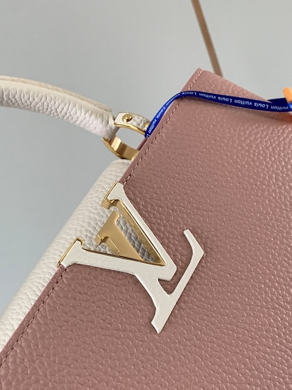 M59466 Rose Pink with Pearl Platinum Buckle]A modern clash of shades in full-grain cowhide leather, this medium Capucines bag features the iconic LV alphabet and side loops, top handles and a detachable shoulder strap fo