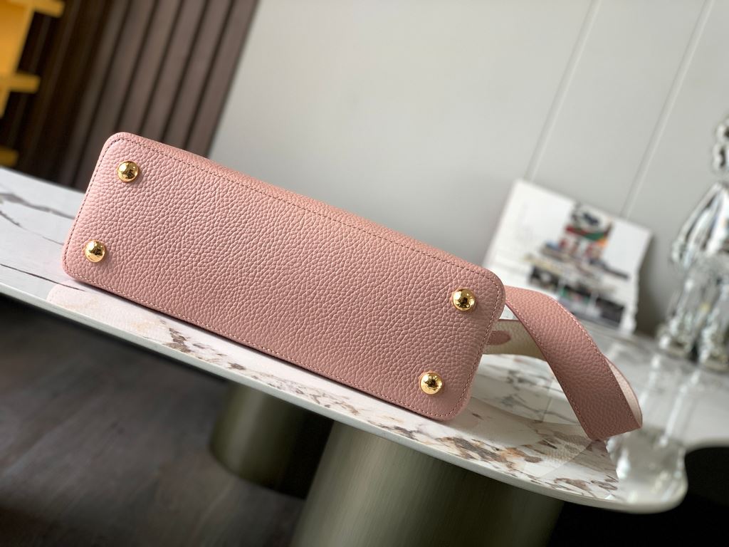 M59466 Rose Pink with Pearl Platinum Buckle]A modern clash of shades in full-grain cowhide leather, this medium Capucines bag features the iconic LV alphabet and side loops, top handles and a detachable shoulder strap fo