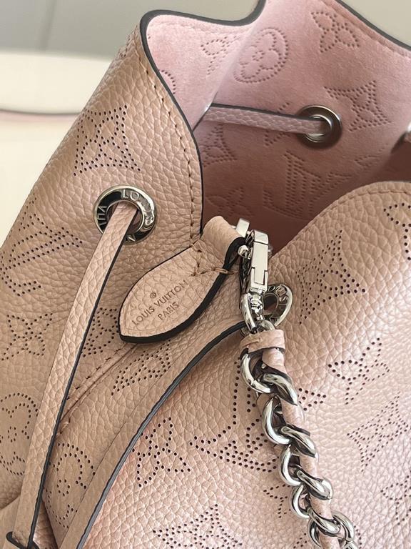 SpecialtyM58791 Pearlescent Pink] M58792 M57068 M57201 The Bella Bucket Bag is crafted from cut-out cowhide leather with a metallic sheen that accentuates the perforated Monogram pattern. The sleek silhouette and round-n