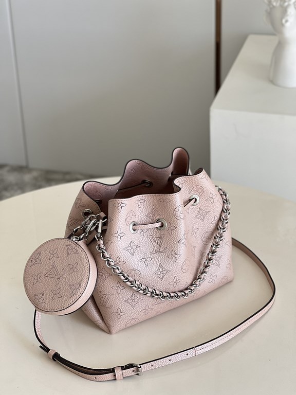 SpecialtyM58791 Pearlescent Pink] M58792 M57068 M57201 The Bella Bucket Bag is crafted from cut-out cowhide leather with a metallic sheen that accentuates the perforated Monogram pattern. The sleek silhouette and round-n