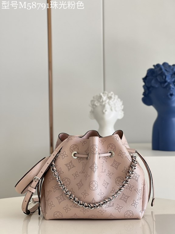 SpecialtyM58791 Pearlescent Pink] M58792 M57068 M57201 The Bella Bucket Bag is crafted from cut-out cowhide leather with a metallic sheen that accentuates the perforated Monogram pattern. The sleek silhouette and round-n