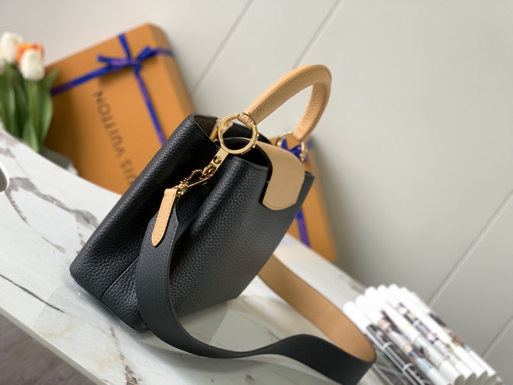 M59465 Black with Apricot Gold Buckle]A modern clash of shades in full-grain cowhide leather, this Capucines BB bag features the iconic LV alphabet and side loops, top handles and a detachable shoulder strap for versatil