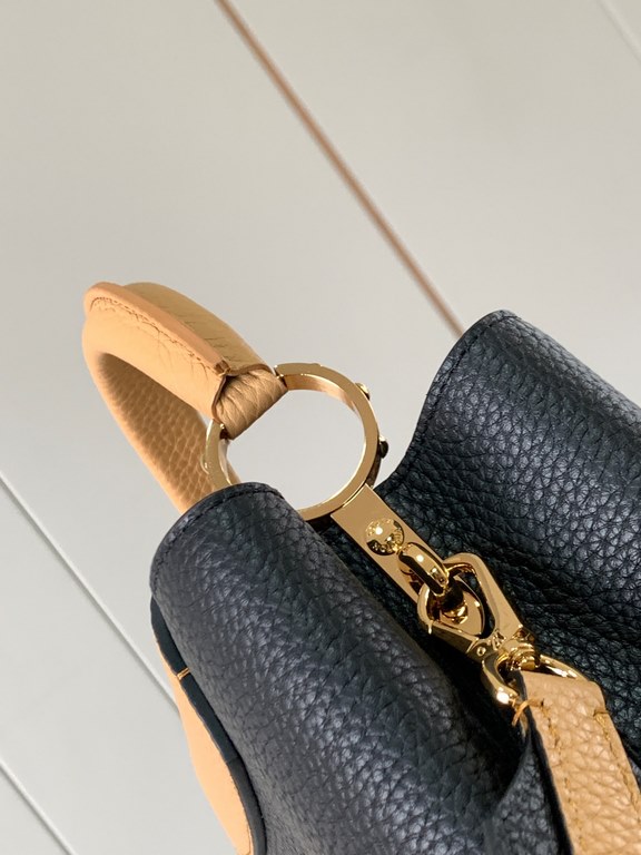 M59465 Black with Apricot Gold Buckle]A modern clash of shades in full-grain cowhide leather, this Capucines BB bag features the iconic LV alphabet and side loops, top handles and a detachable shoulder strap for versatil