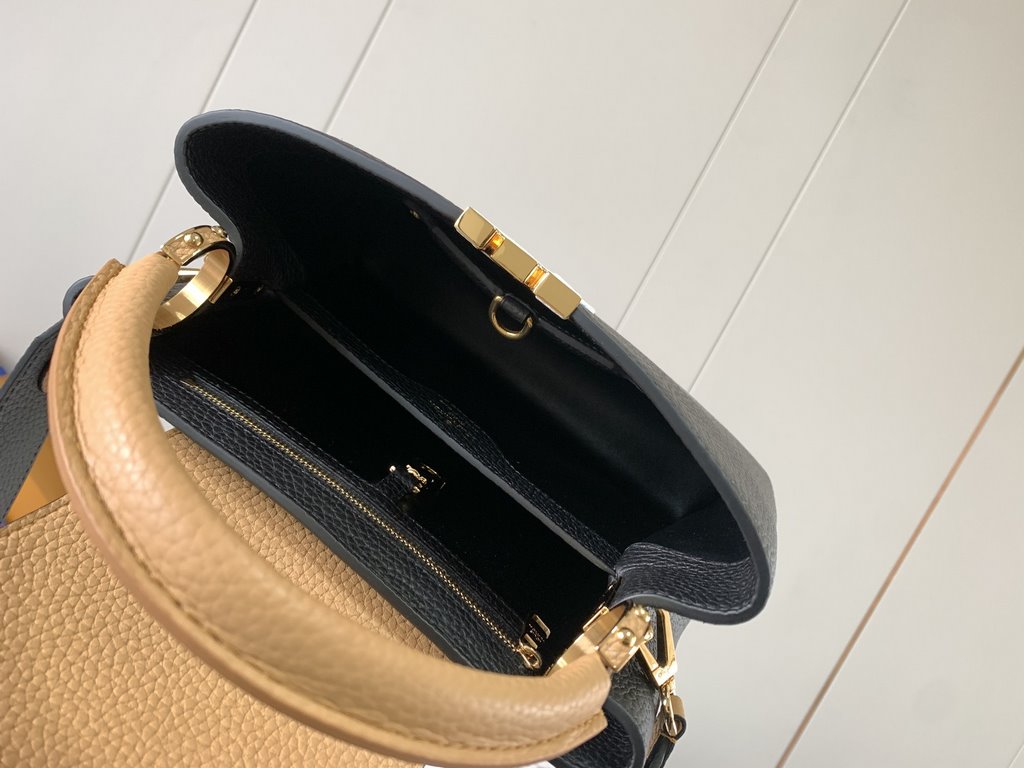 M59465 Black with Apricot Gold Buckle]A modern clash of shades in full-grain cowhide leather, this Capucines BB bag features the iconic LV alphabet and side loops, top handles and a detachable shoulder strap for versatil