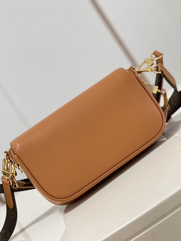 TopThe M20393 Brown M20396 Swing bag was unveiled on the SpringSummer 2022 runway, with an on-trend reinterpretation of Louis Vuitton's Pochette Métis bag, a long and slender bag. The classic S-lock closure extends its p