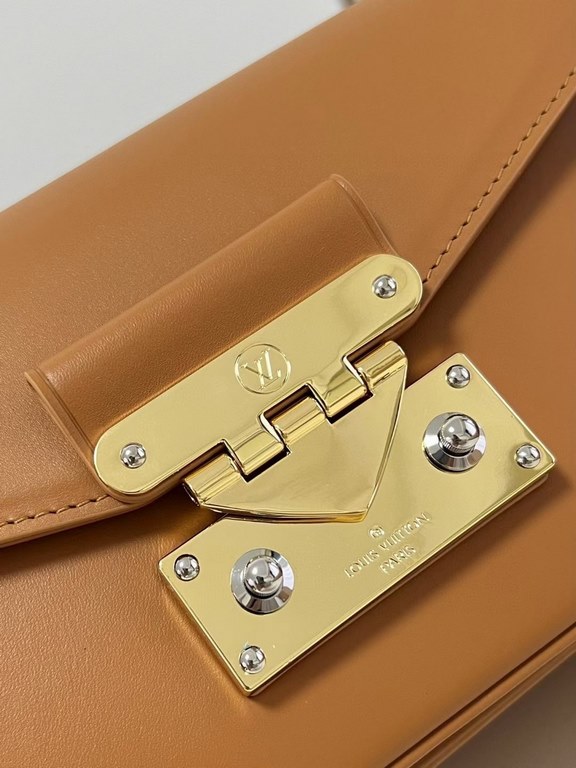 TopThe M20393 Brown M20396 Swing bag was unveiled on the SpringSummer 2022 runway, with an on-trend reinterpretation of Louis Vuitton's Pochette Métis bag, a long and slender bag. The classic S-lock closure extends its p