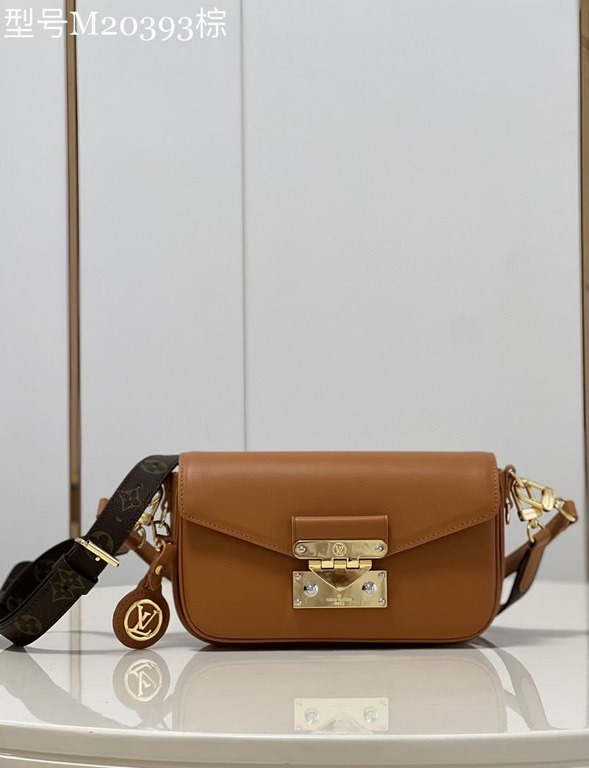 TopThe M20393 Brown M20396 Swing bag was unveiled on the SpringSummer 2022 runway, with an on-trend reinterpretation of Louis Vuitton's Pochette Métis bag, a long and slender bag. The classic S-lock closure extends its p