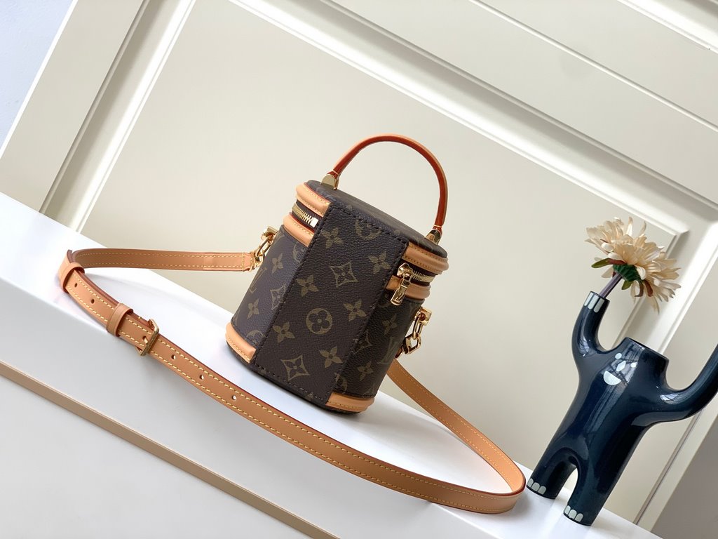 Top of the line [Exclusive M82952 】The Nano Cannes bag is cut from Monogram canvas in a cylindrical shape that mirrors the design of the cosmetic bag. Leather trims and the Louis Vuitton logo embossed on the label enrich